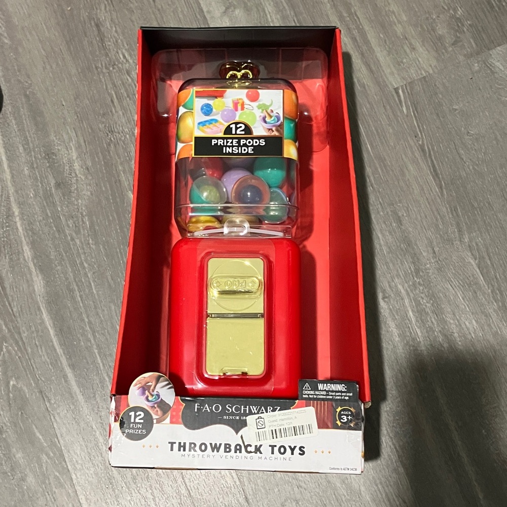 FAO Schwarz Red and Gold Retro Vending Machine